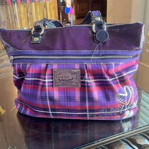 Coach Poppy design purse
Purple with some pink
Like new